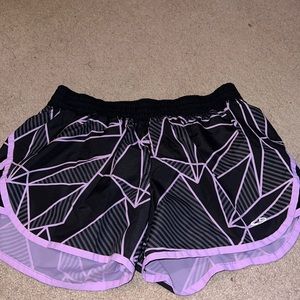 Black and purple champion shorts.